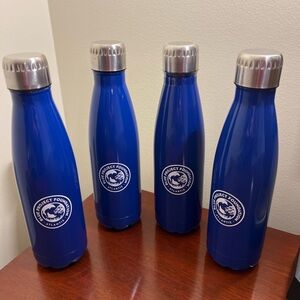 Four Atlantis water bottles
